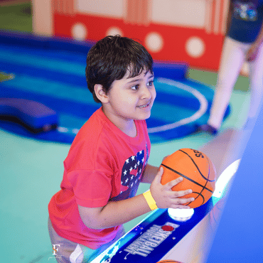 Child playing at Wooray Elite Delhi's soft play zone in Ghitorni