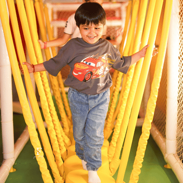 Child playing at Wooray Elite Delhi's soft play zone in Ghitorni