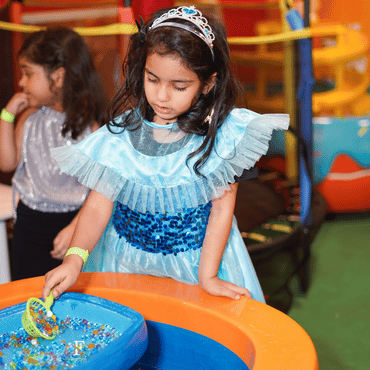 Child playing at Wooray Elite Delhi's soft play zone in Ghitorni