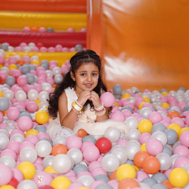 Child playing at Wooray Elite Delhi's soft play zone in Ghitorni